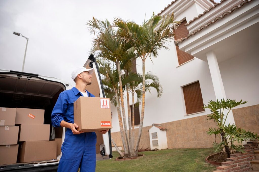 medium shot delivery man holding box 23 2149103448